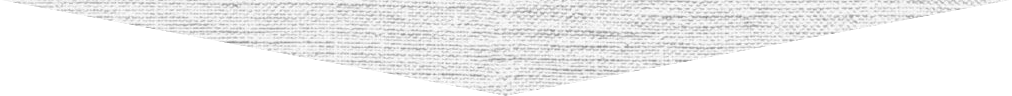 Gray-scale textured triangle pointing downward on a white background.